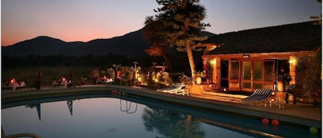 Outdoor pool, open 8:00 AM to 8:00 PM, pool umbrellas, pool loungers