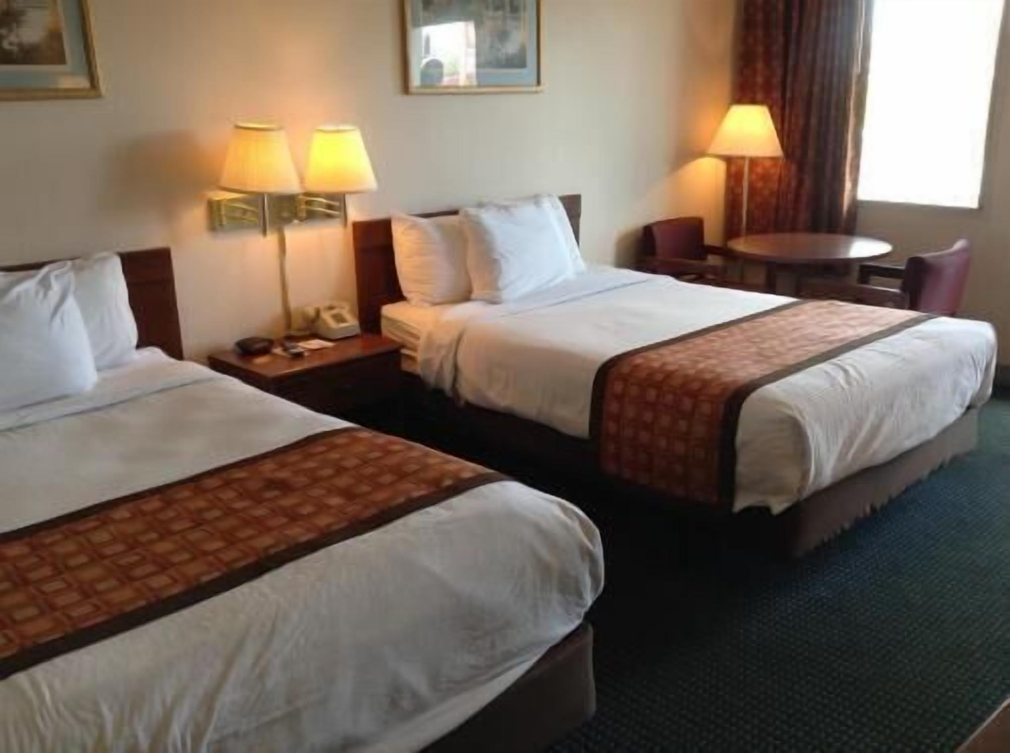 Desk, blackout curtains, free cots/infant beds, free WiFi