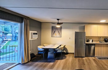 Family Suite, Non Smoking, River View | Premium bedding, pillowtop beds, individually decorated at Interurban Suites Hotel