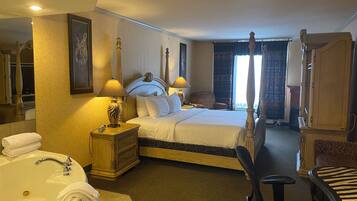 Premium bedding, desk, laptop workspace, iron/ironing board