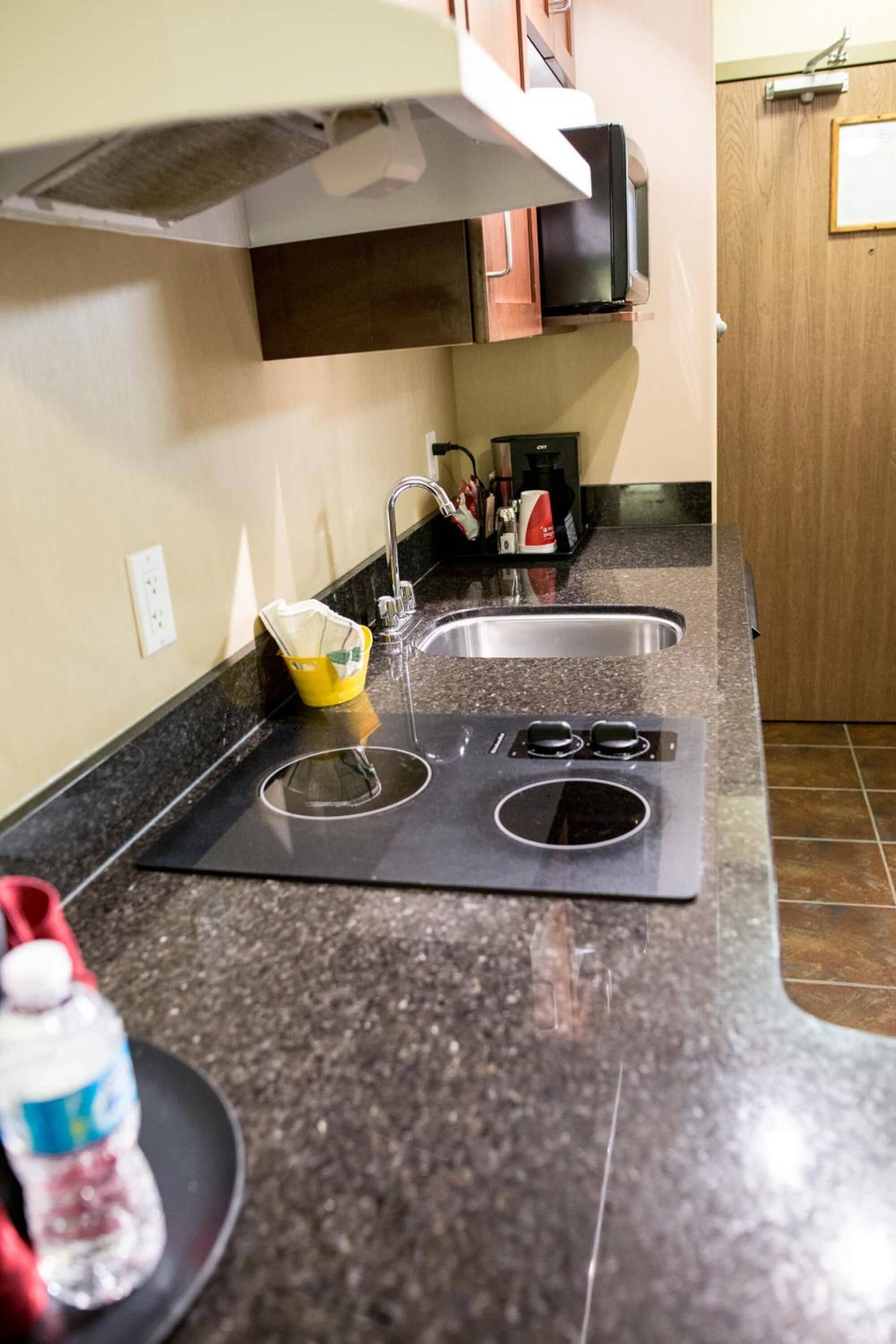 Coffee/tea maker, fridge, microwave