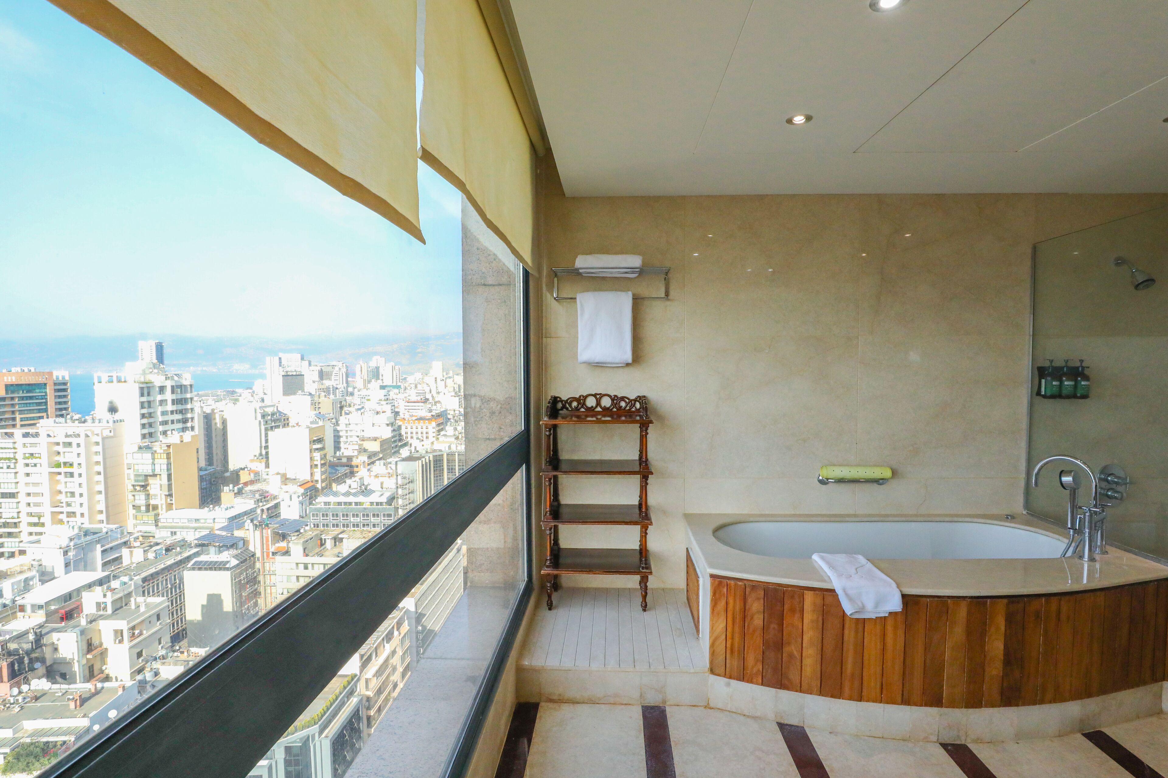combined shower/bathtub, hair dryer, bathrobes, slippers
