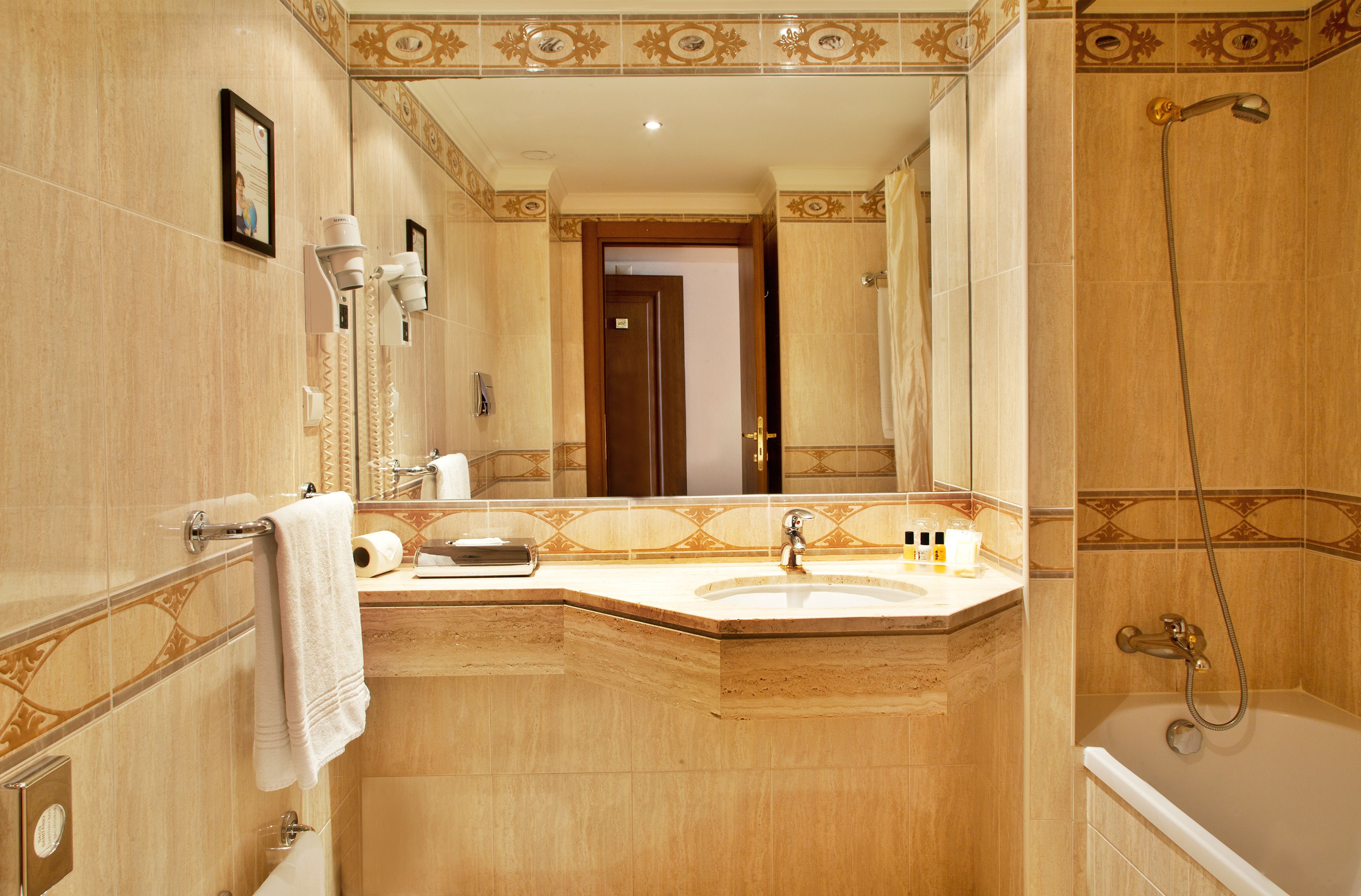 free toiletries, hair dryer, bidet, towels