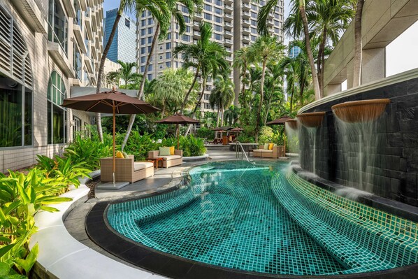 Outdoor pool, open 6:00 AM to 9:00 PM, pool umbrellas, pool loungers