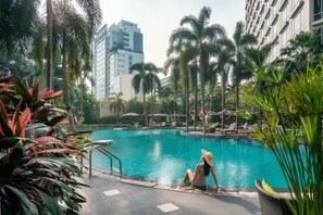 Outdoor pool, open 6:00 AM to 9:00 PM, pool umbrellas, sun loungers