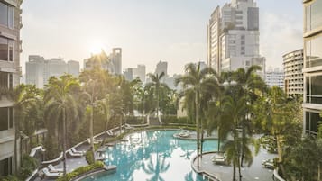 Outdoor pool, open 6:00 AM to 9:00 PM, pool umbrellas, sun loungers