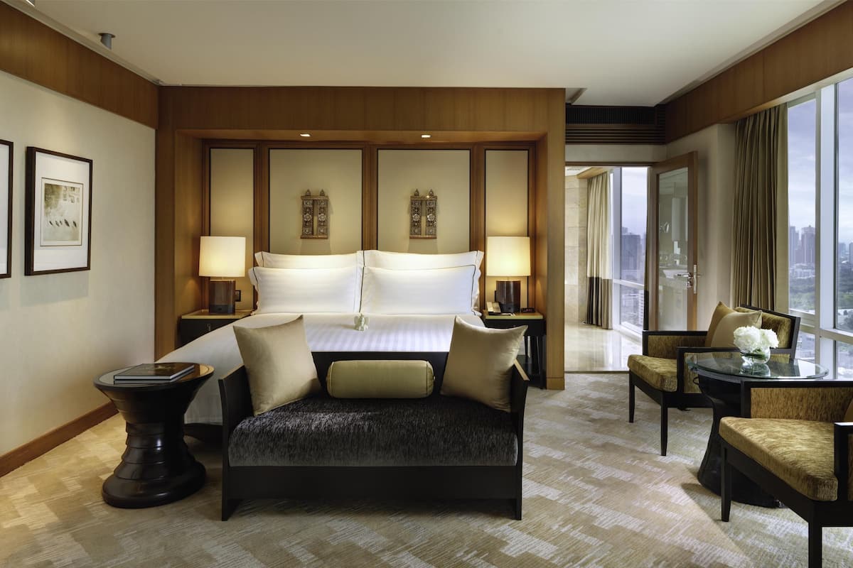 Suite, 1 King Bed (Conrad) | Living area | 42-inch LED TV with satellite channels, TV, iPod dock