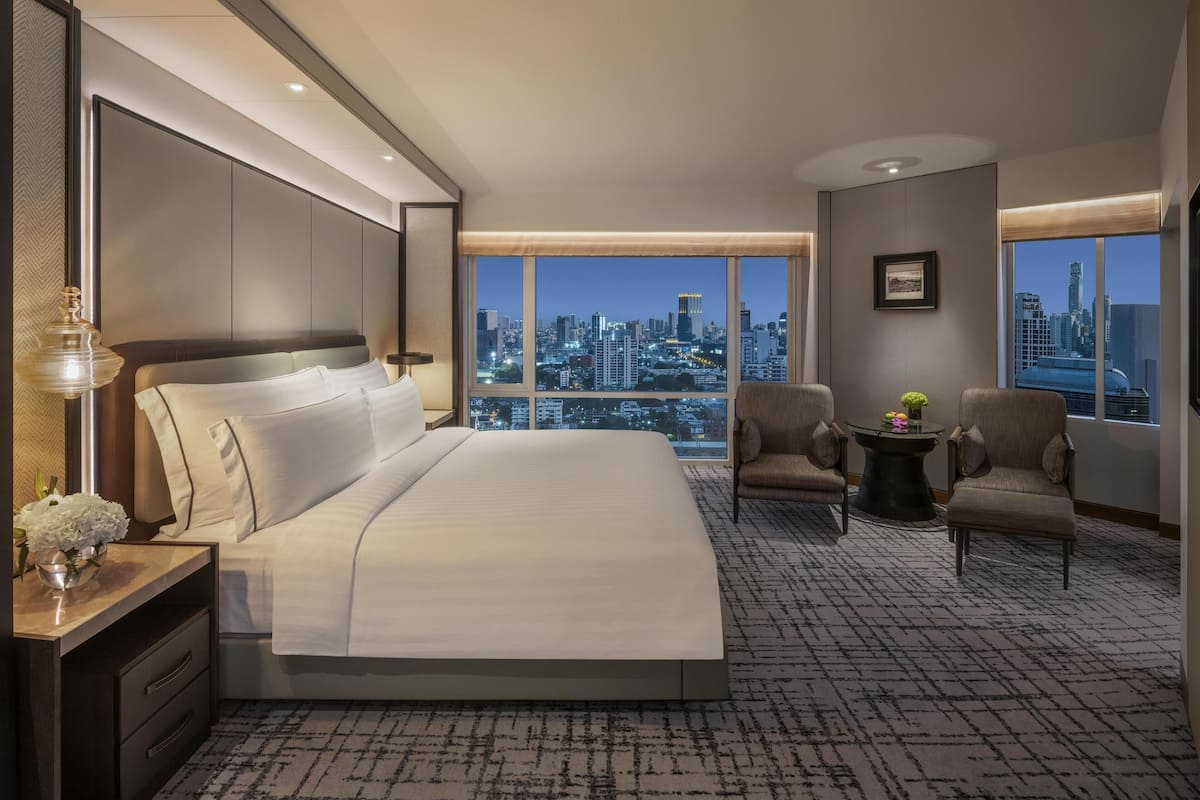 Grand Room, 1 King Bed (Premium) | Living area | 42-inch LED TV with satellite channels, TV, iPod dock