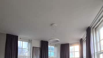 City Apartment | Living area | 45-inch flat-screen TV with digital channels, TV