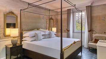 Suite, 1 letto king, vista giardino | 1 camera, biancheria da letto ipoallergenica, copriletto in piuma