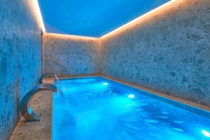 Indoor pool, seasonal outdoor pool, pool umbrellas, pool loungers