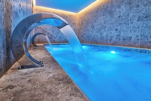Indoor pool, seasonal outdoor pool, pool umbrellas, pool loungers