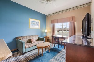 Ropa de cama hipoalergénica, escritorio y tabla de planchar con plancha