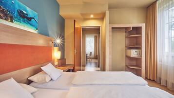 Habitación familiar (3 beds, 2 rooms) | 4 habitaciones, ropa de cama de alta calidad y camas con pillow-top