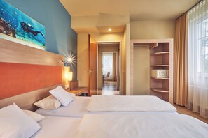 Habitación familiar (3 beds, 2 rooms) | 4 habitaciones, ropa de cama de alta calidad y camas con pillow-top