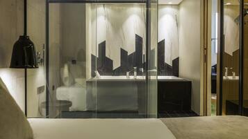 Hypo-allergenic bedding, down duvets, memory-foam beds, in-room safe