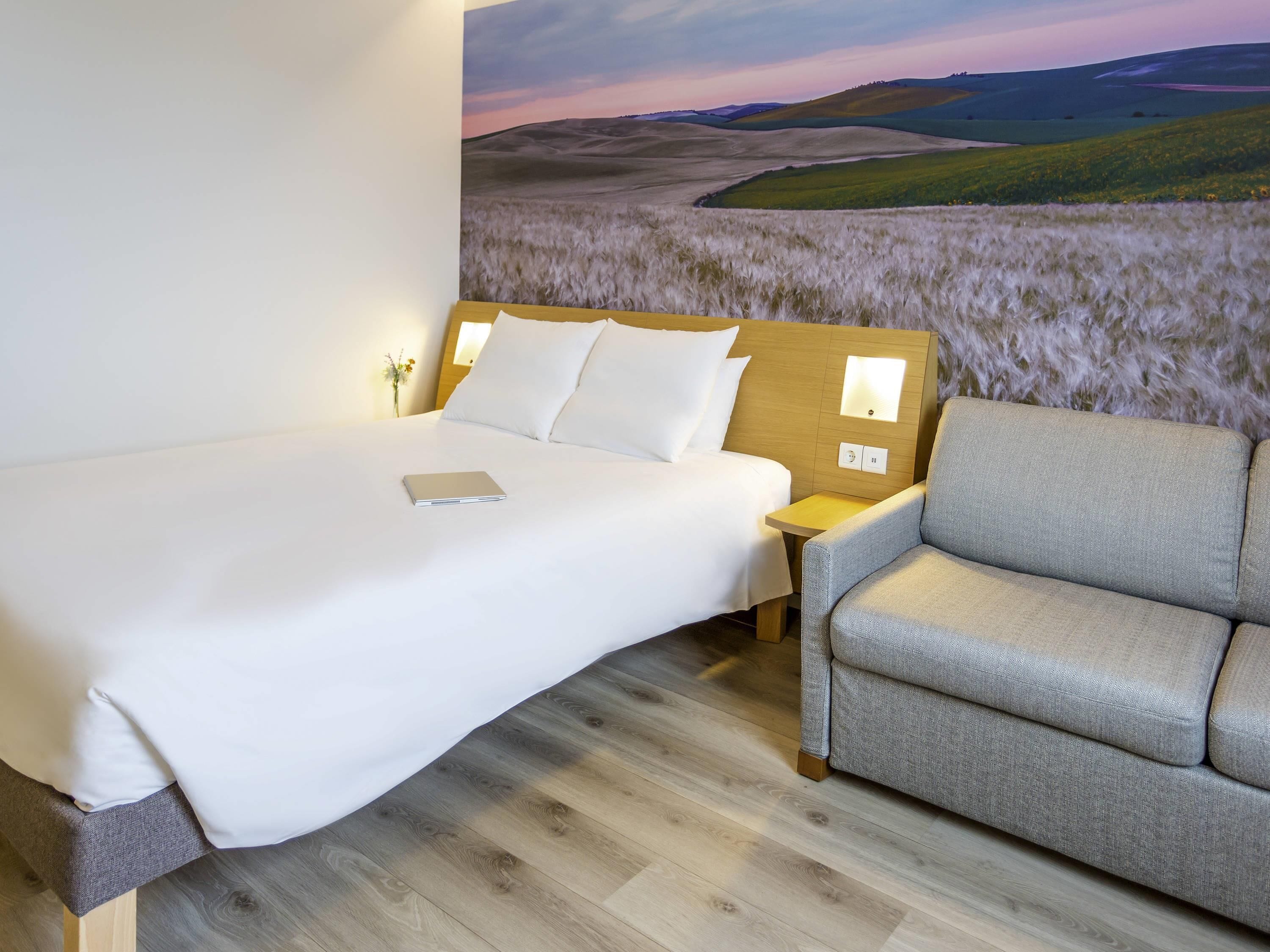 Hypo-allergenic bedding, down duvets, memory-foam beds, in-room safe