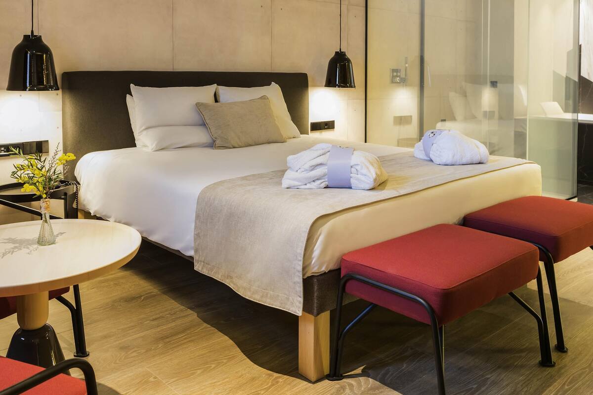 Hypo-allergenic bedding, down duvets, memory-foam beds, in-room safe