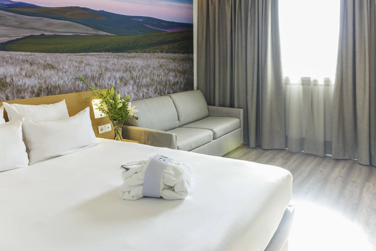 Hypo-allergenic bedding, down duvets, memory-foam beds, in-room safe