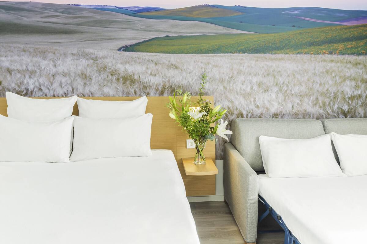 hypo-allergenic bedding, down duvets, memory-foam beds, in-room safe