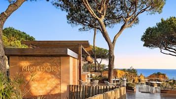 3 bars/lounges, 3 poolside bars, swim-up bar