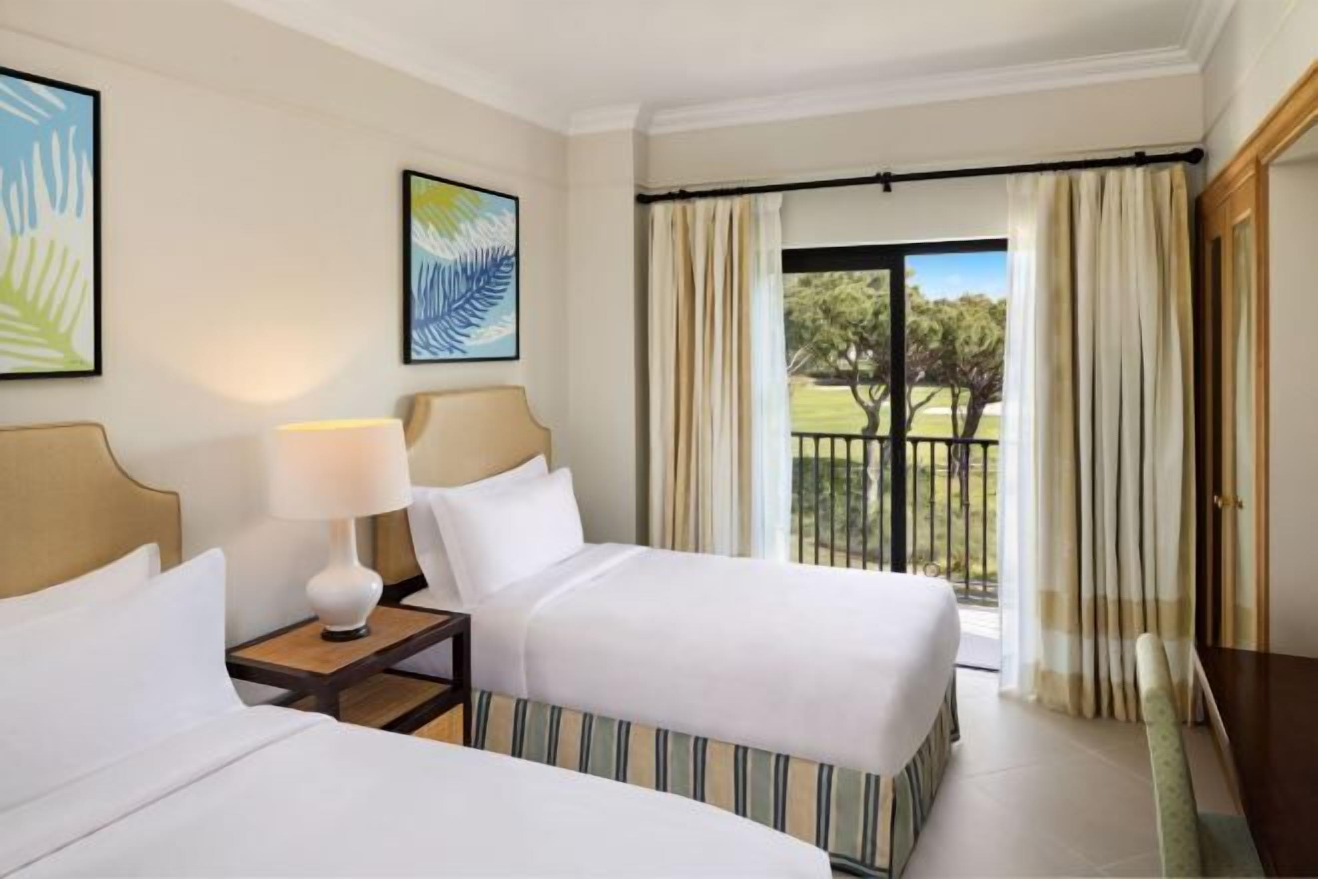 Premium bedding, pillow-top beds, in-room safe, desk