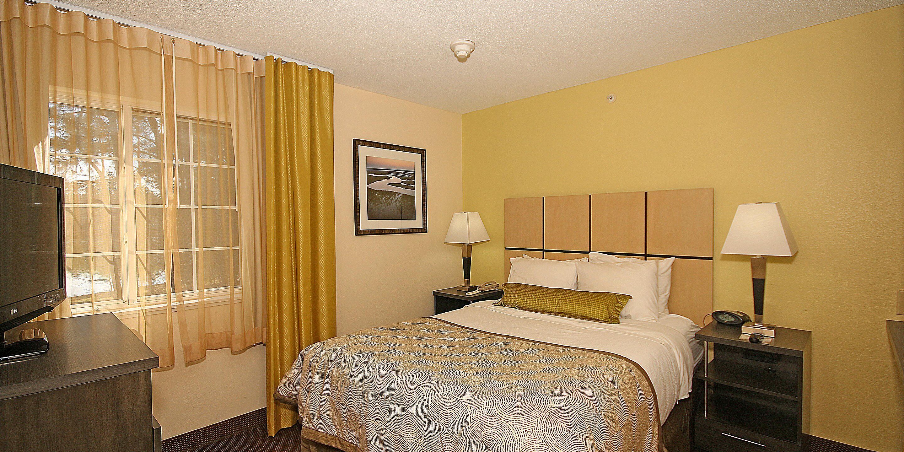 desk, laptop workspace, blackout curtains, iron/ironing board