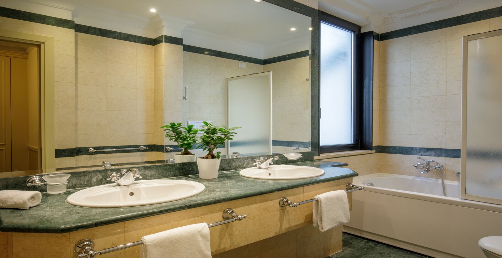 junior studio suite | bathroom | rainfall showerhead, free toiletries, hair dryer, bidet