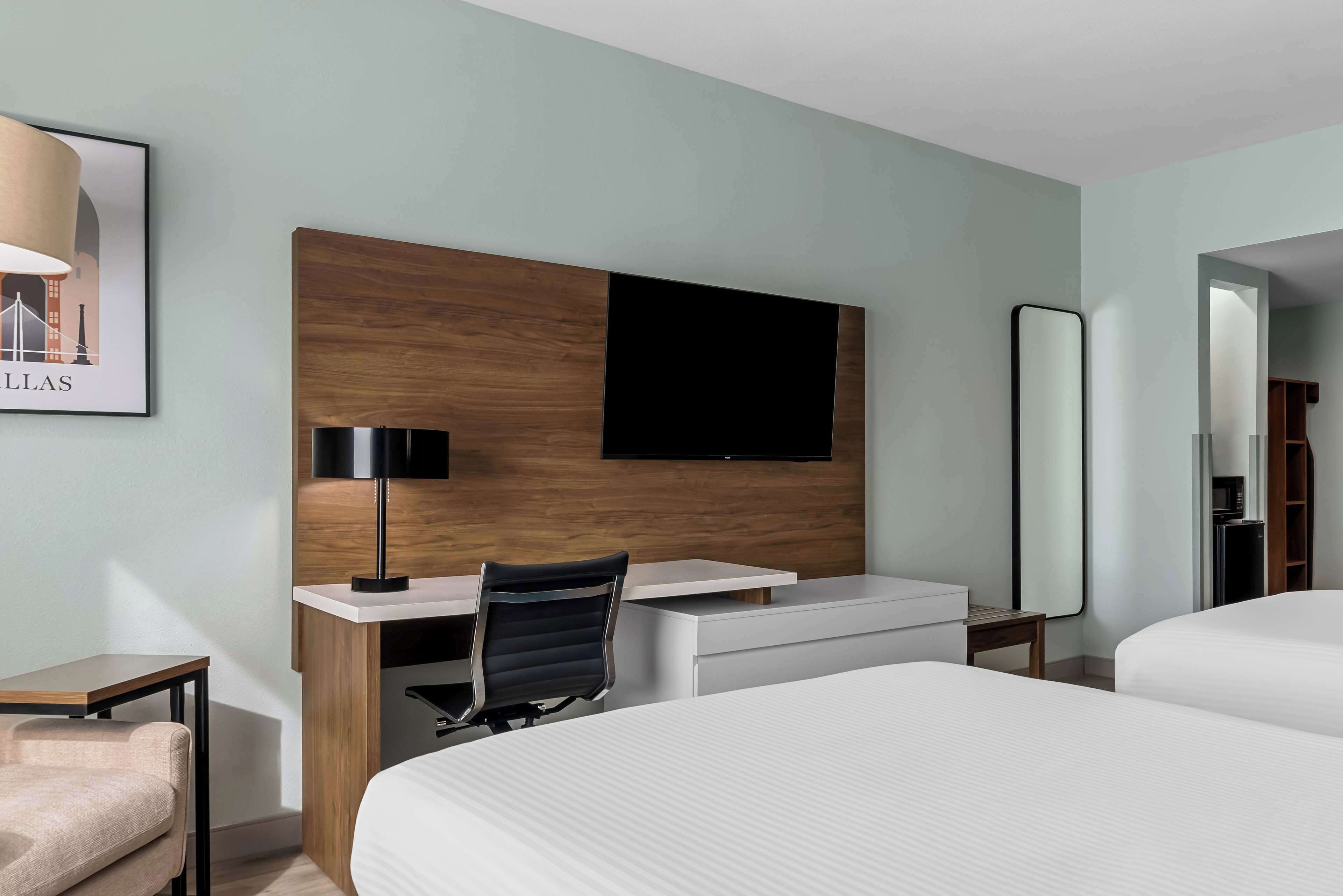 standard room, 2 queen beds, non smoking, refrigerator & microwave | in-room safe, desk, laptop workspace, iron/ironing board