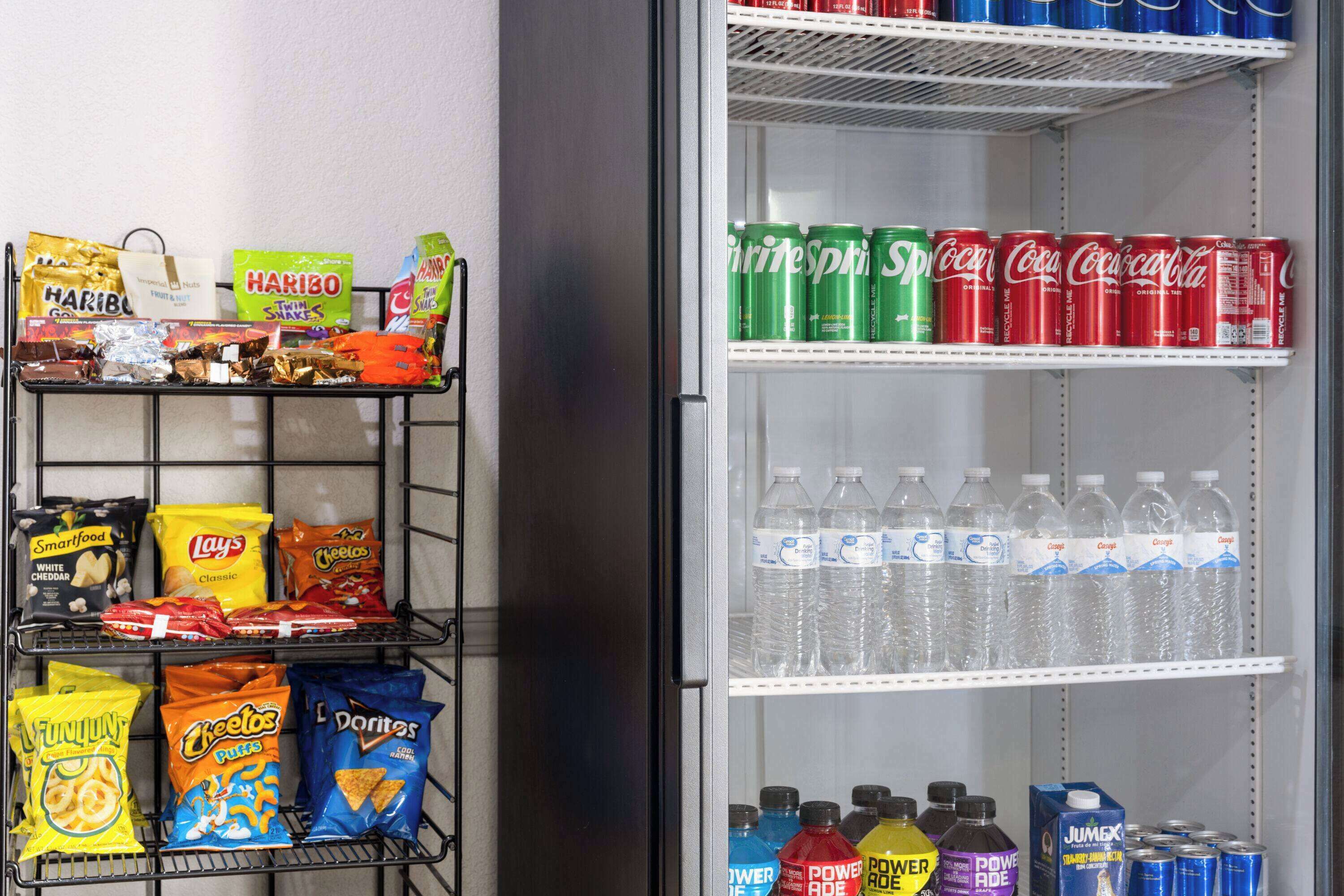 A vending machine stocked with snacks and beverages.