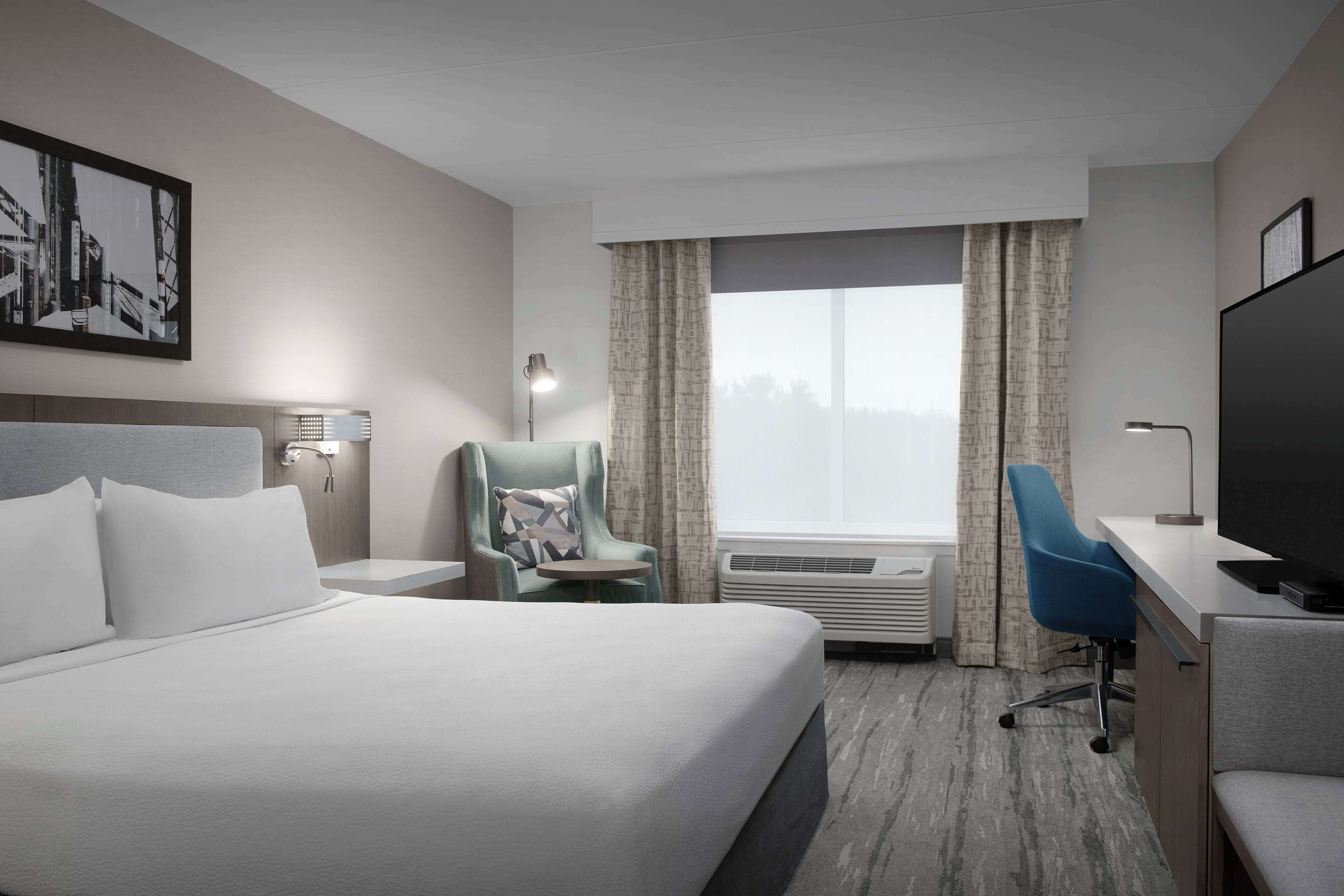 desk, laptop workspace, blackout curtains, iron/ironing board