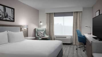 Desk, laptop workspace, blackout drapes, iron/ironing board