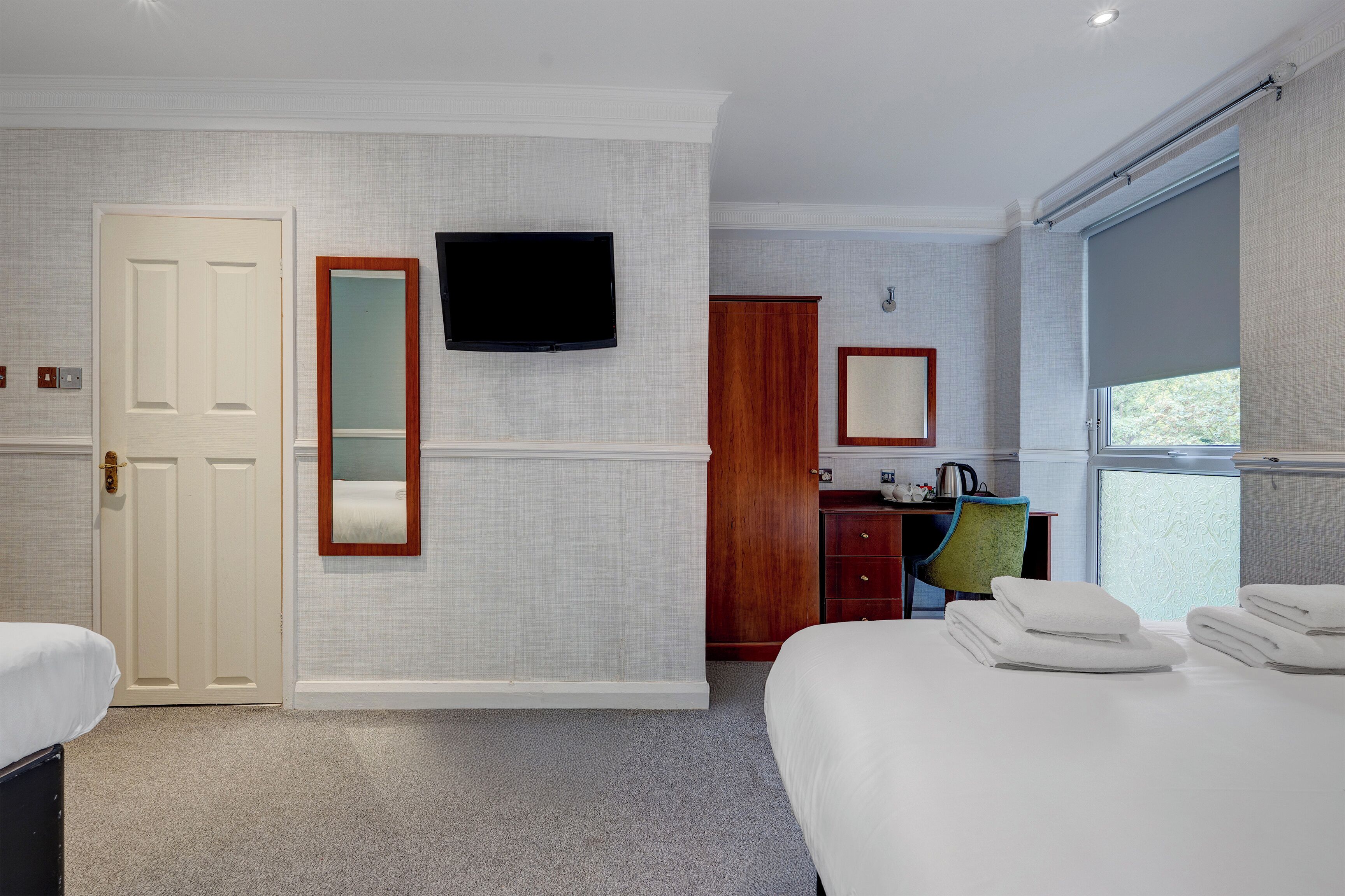 standard quad room | desk, iron/ironing board, cots/infant beds, rollaway beds