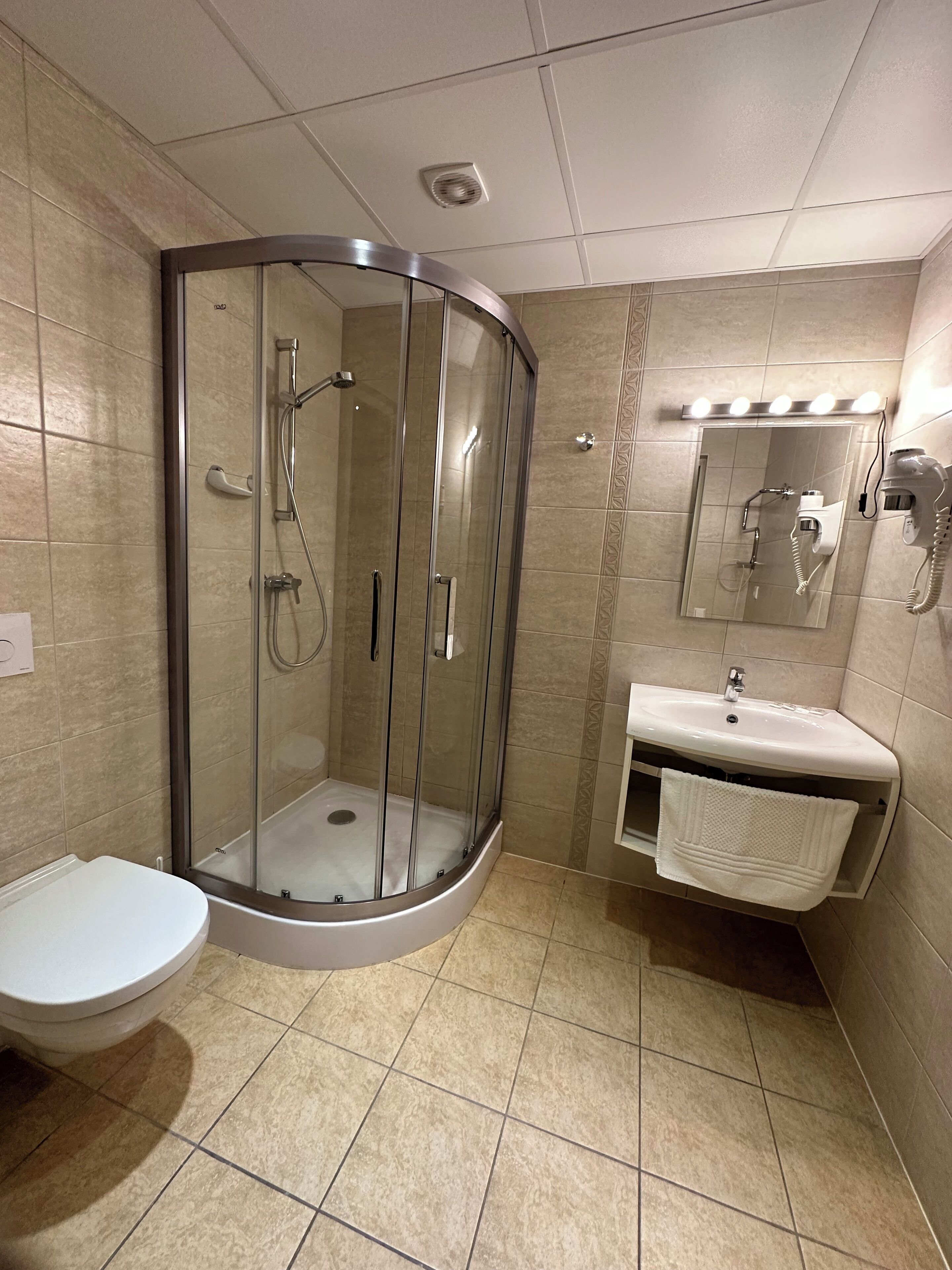 comfort quadruple room | bathroom | free toiletries, hair dryer, towels