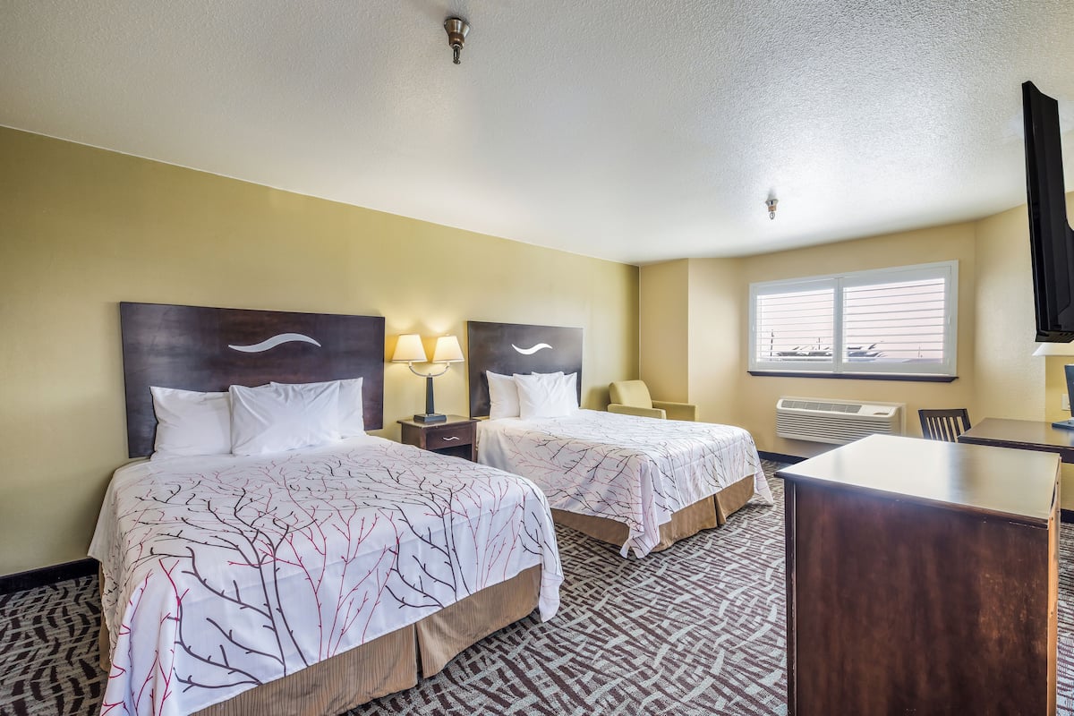 Desk, laptop workspace, blackout curtains, iron/ironing board