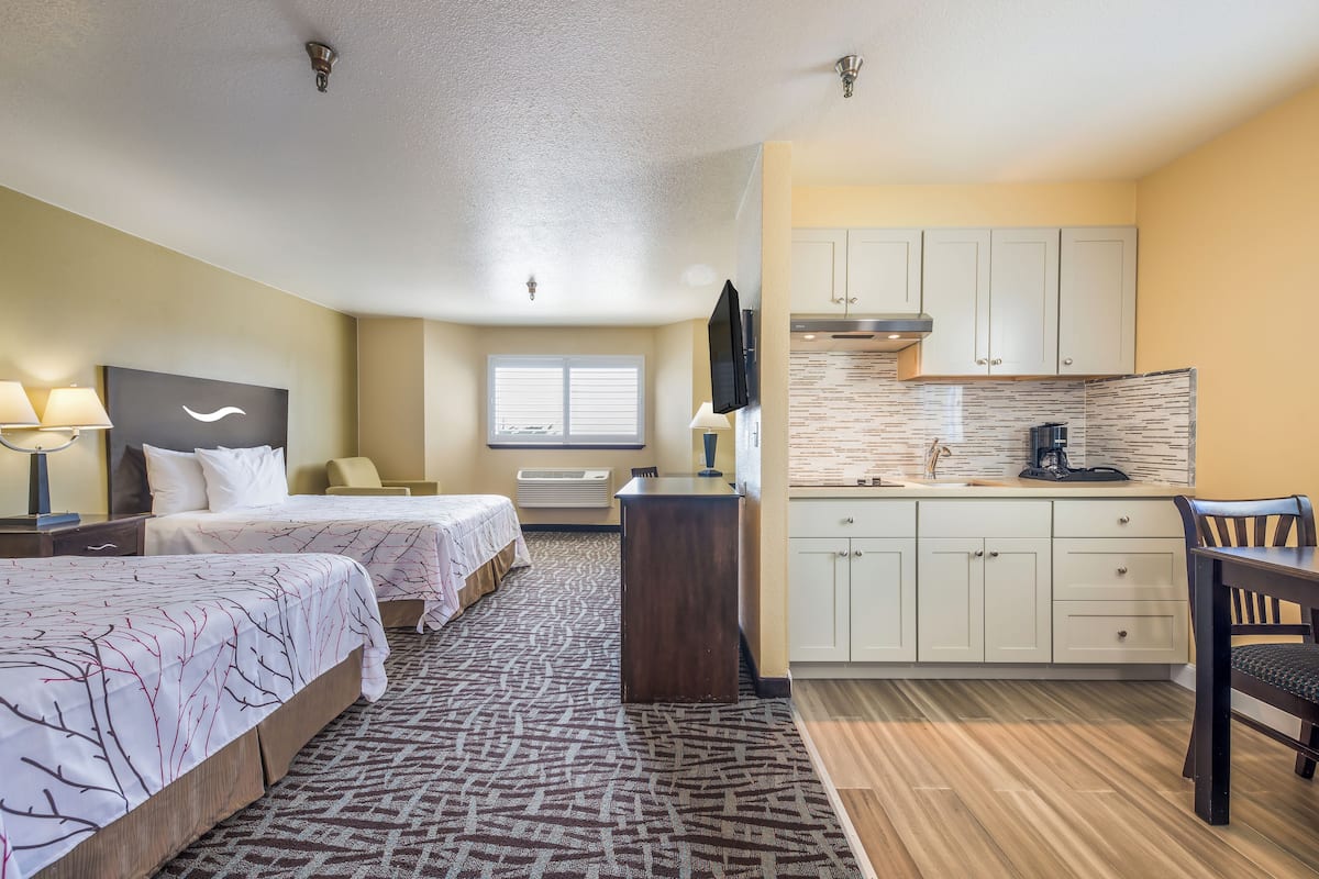 Desk, laptop workspace, blackout curtains, iron/ironing board