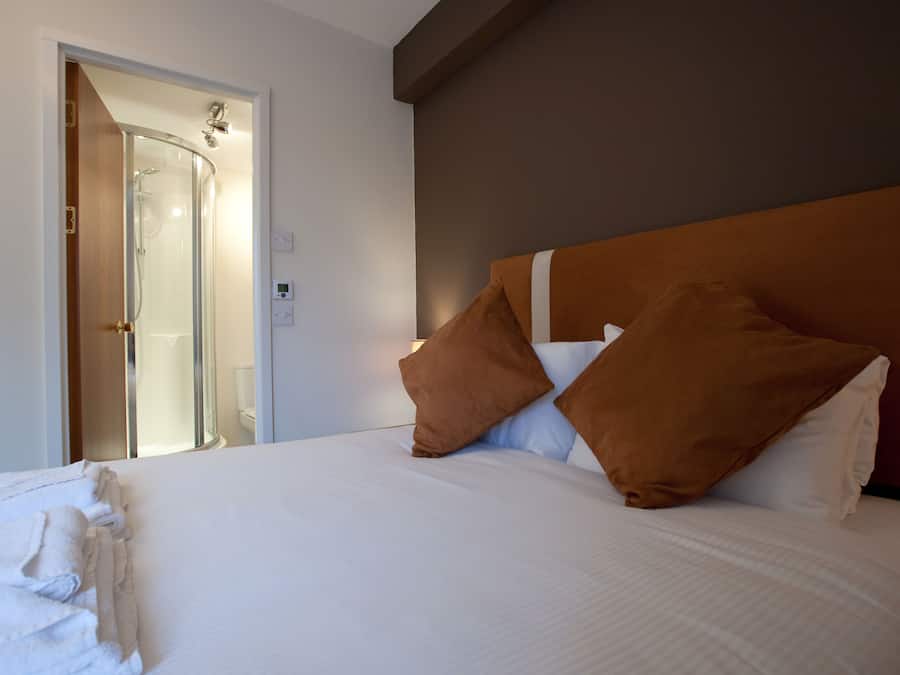 Sábanas de algodón egipcio y cortinas opacas