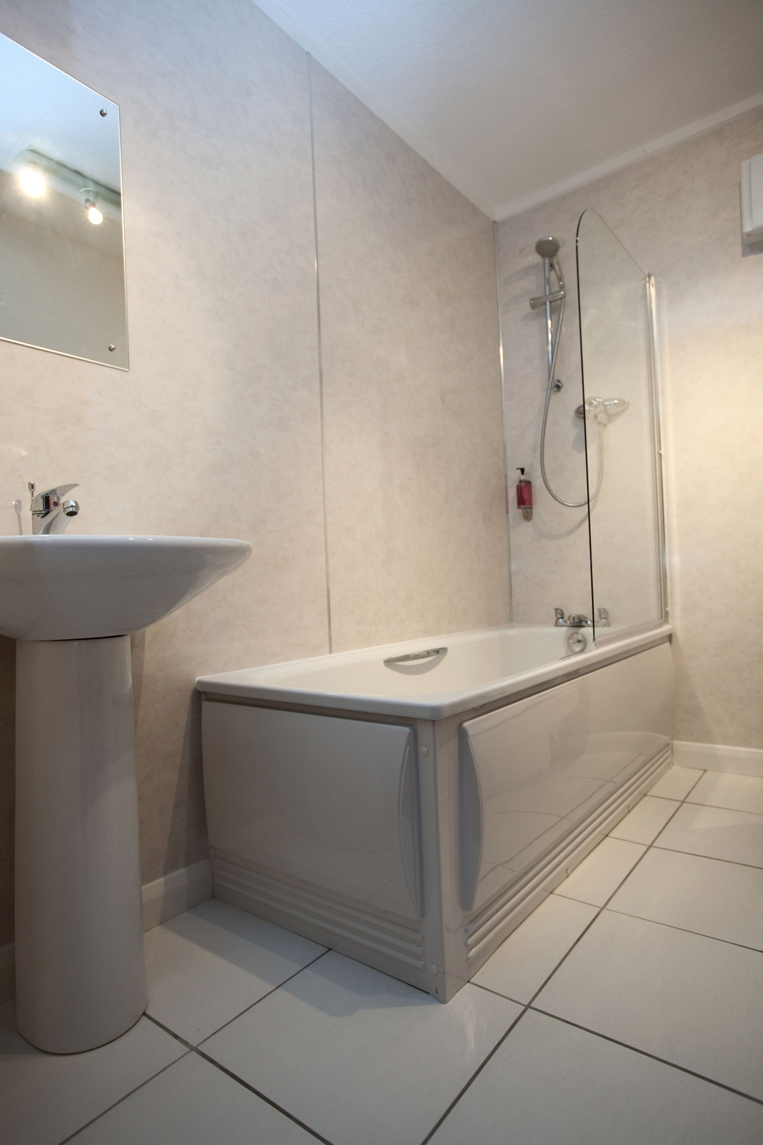 combined shower/bathtub, free toiletries, hair dryer, towels