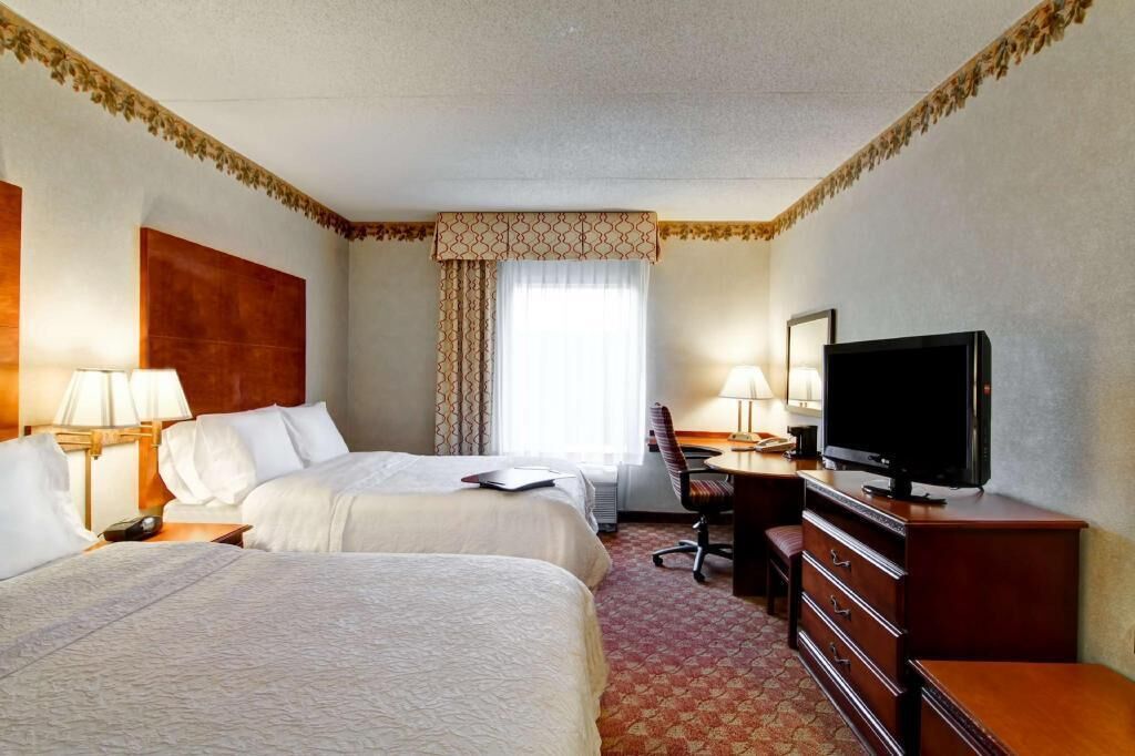 Premium bedding, desk, blackout curtains, iron/ironing board