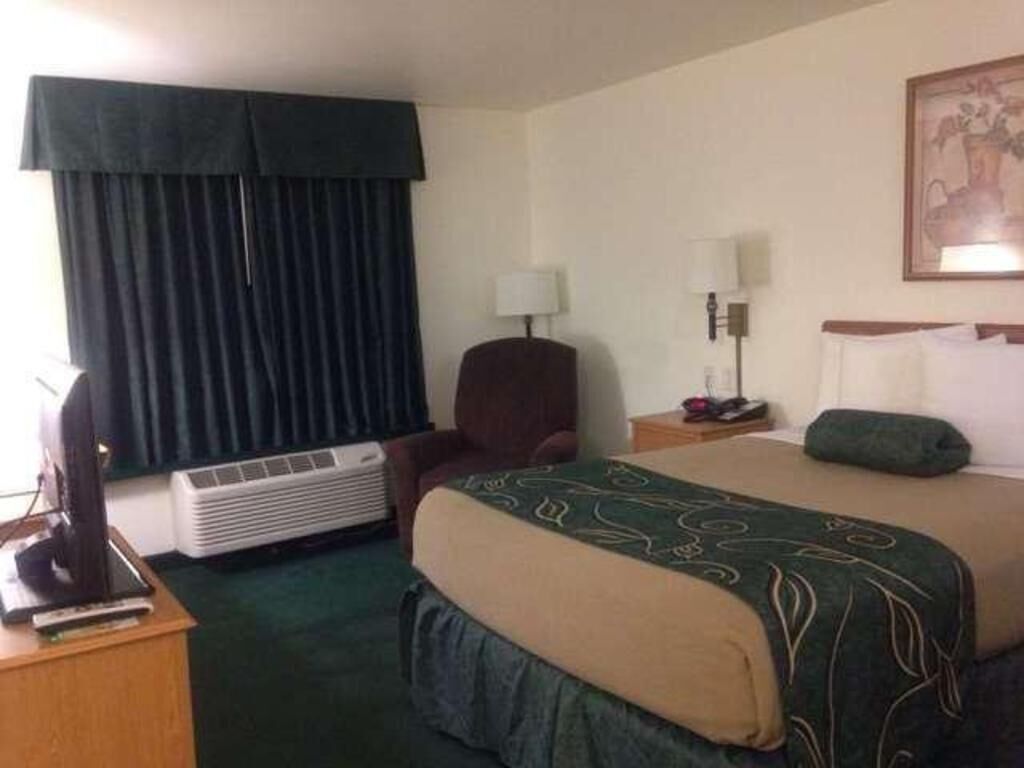 Desk, blackout curtains, iron/ironing board, free cots/infant beds