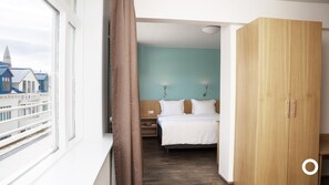 Superior Double or Twin Room | Minibar, desk, laptop workspace, blackout drapes
