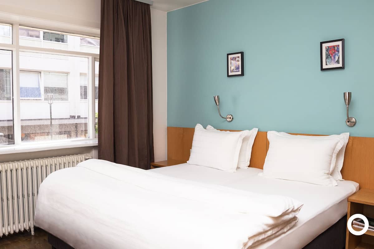 Standard Double Room | Minibar, desk, laptop workspace, blackout curtains