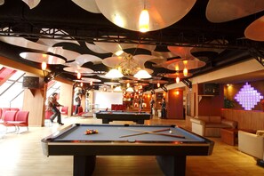 4 bars/lounges, poolside bar, beach bar