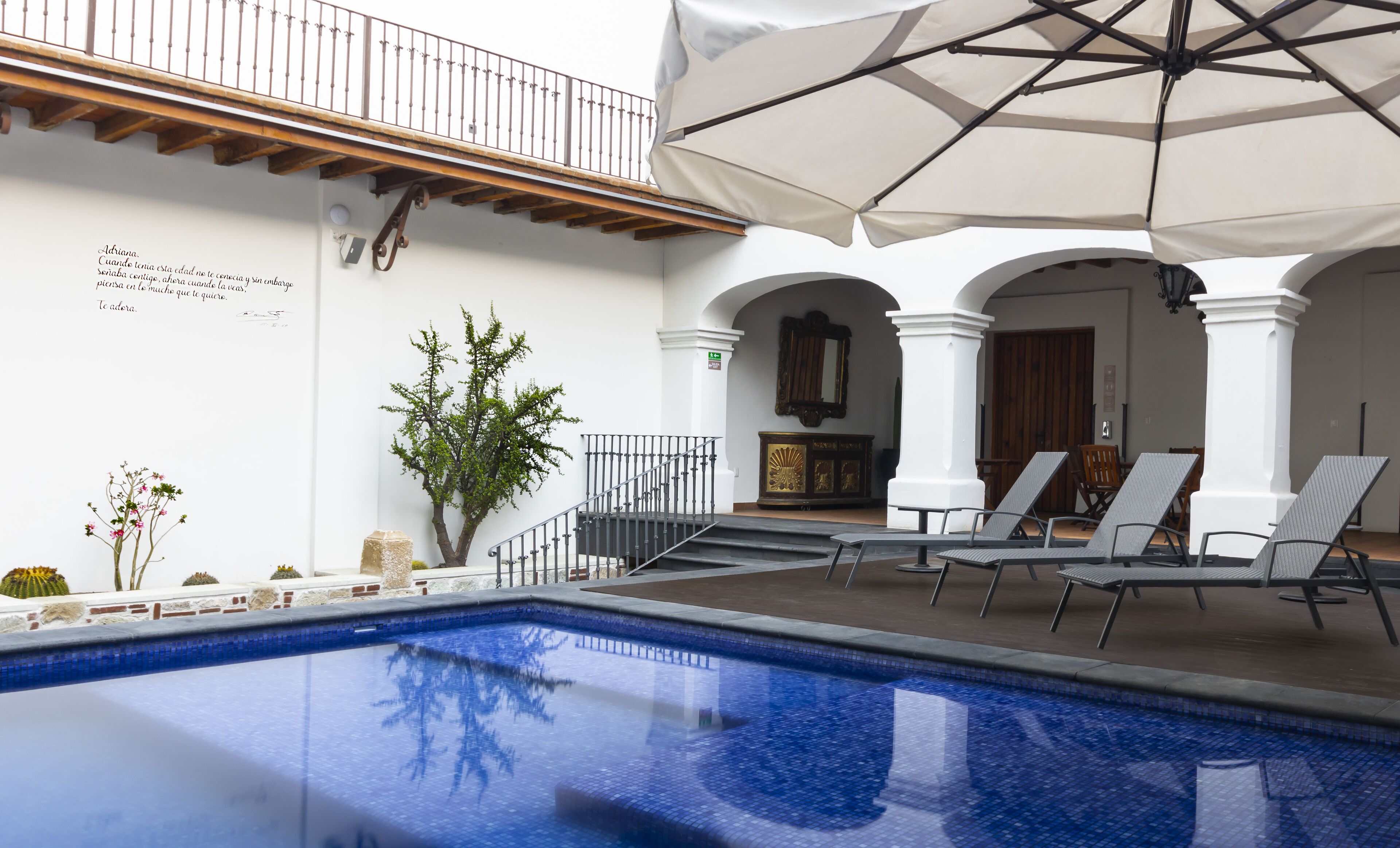 Outdoor pool, open 8:00 AM to 9:00 PM, pool loungers