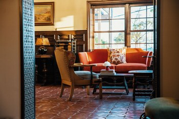 Sitting area in hotel lobby at Capistrano Coast House