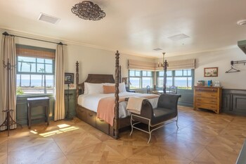 Hacienda Suite | Premium bedding, pillowtop beds, iron/ironing board, free WiFi at Capistrano Coast House