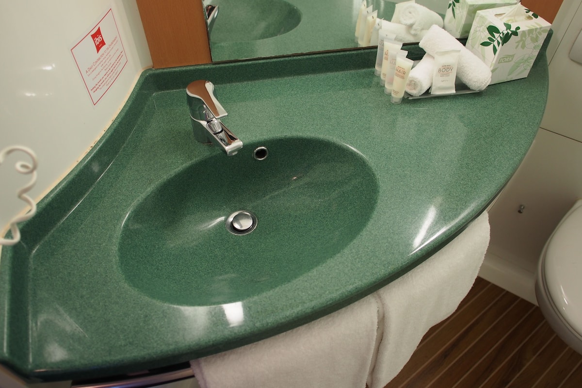 shower, eco-friendly toiletries, hair dryer, towels