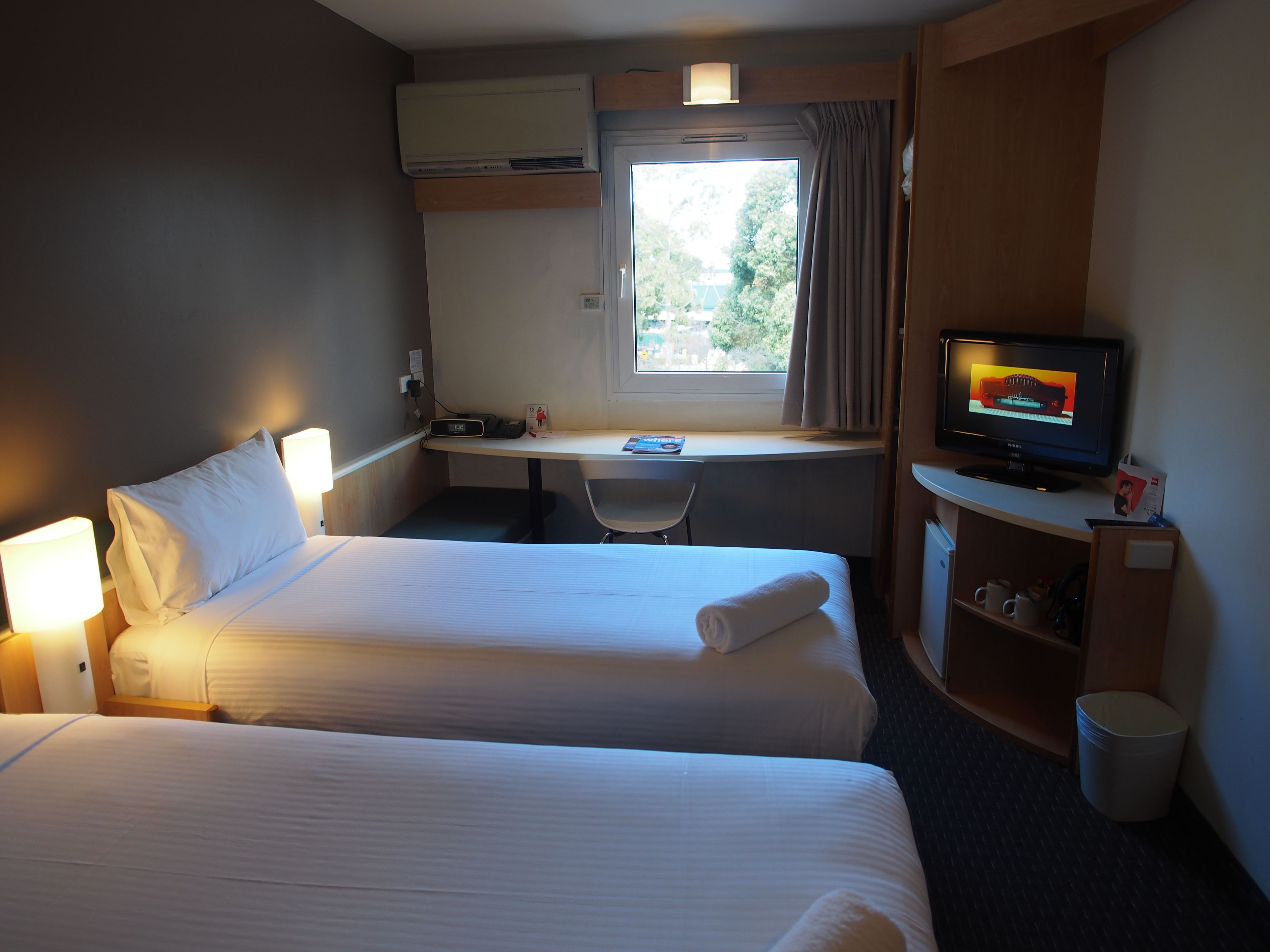 standard room, 2 single beds | in-room safe, desk, soundproofing, iron/ironing board