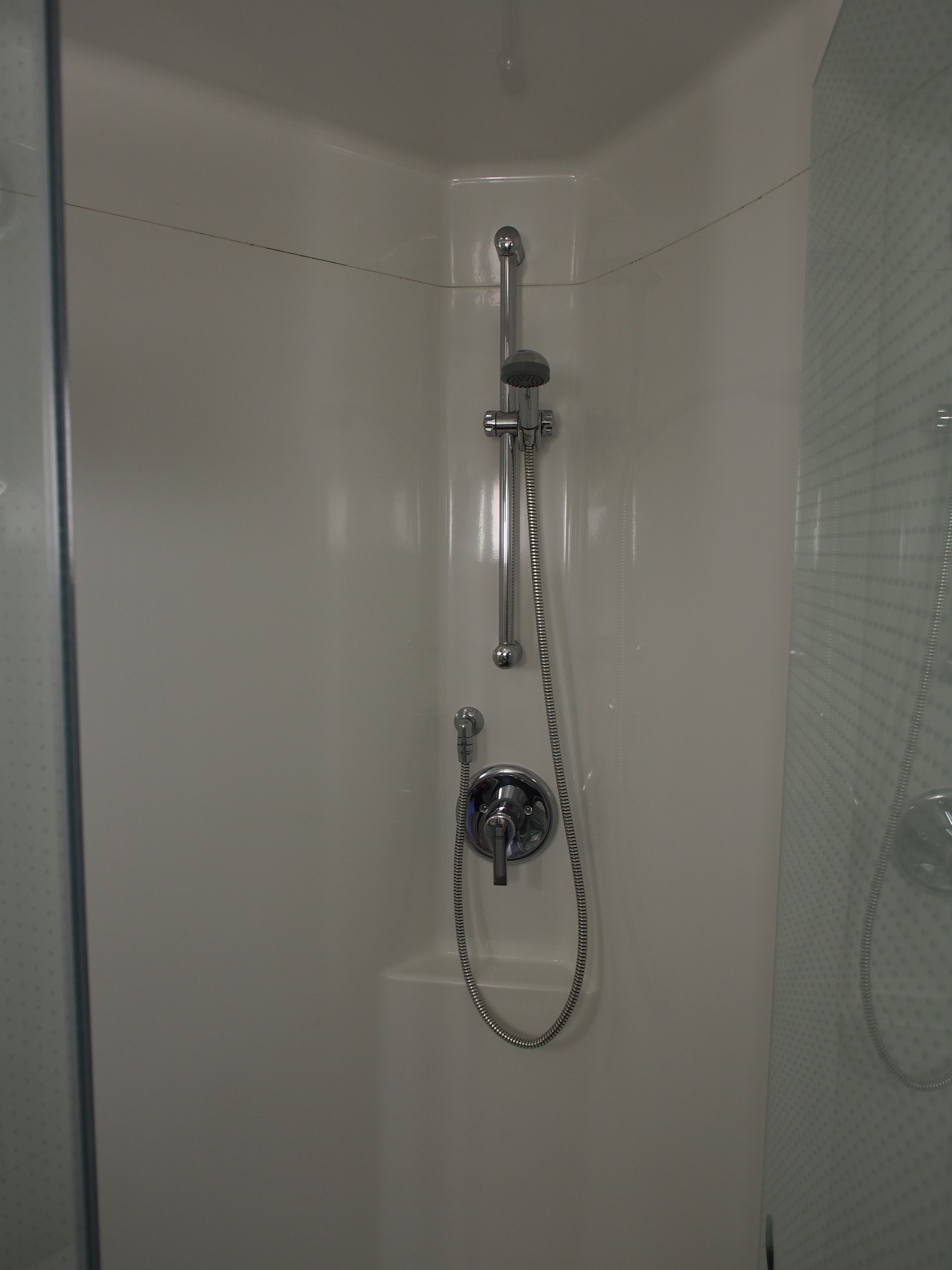 shower, eco-friendly toiletries, hair dryer, towels