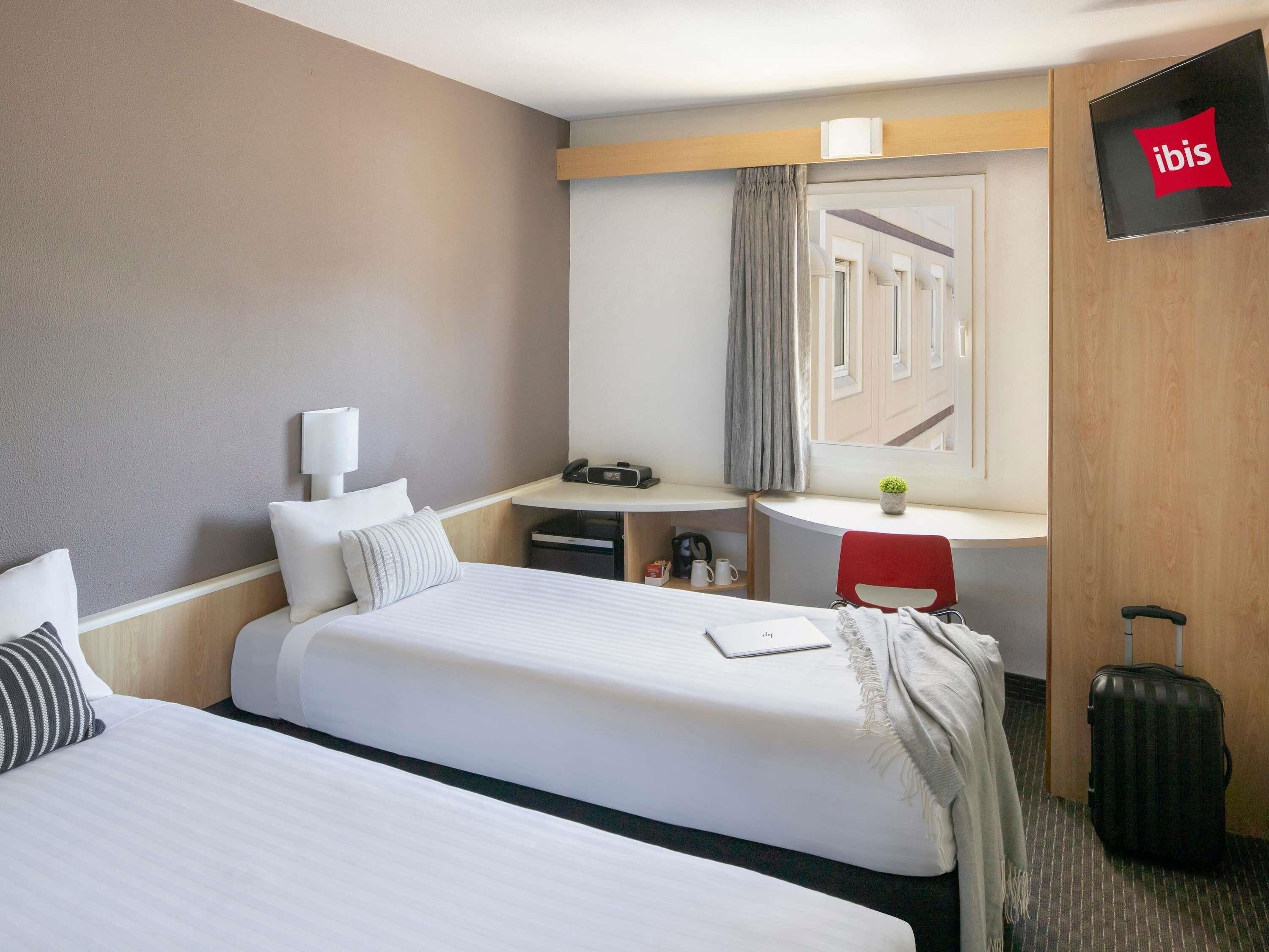 Standard Room, 2 Twin Beds | In-room safe, desk, soundproofing, iron/ironing board